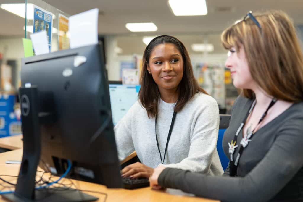 two students at a computer
