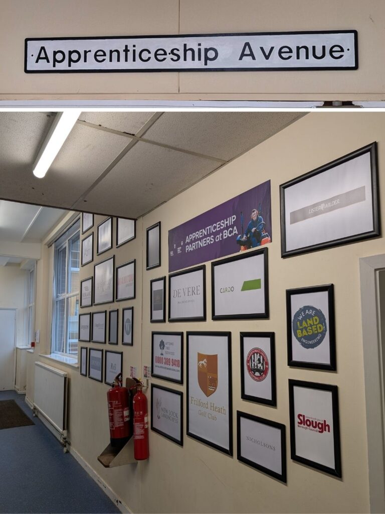 A photo of the Apprenticeship Avenue sign and the whole wall
